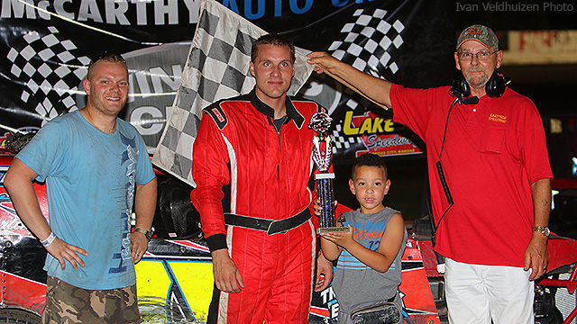 Aaron Marrant celebrates in victory lane after winning the USRA Modified feature.