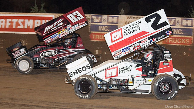 Shane Stewart (2) races with Joey Saldana (83) in World of Outlaws Craftsman Sprint Car Series action.