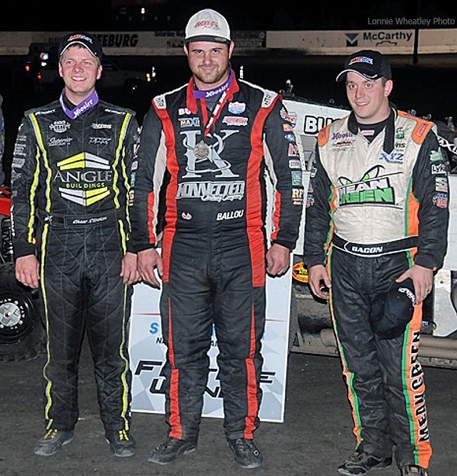 USAC feature winner Robert Ballou is flanked by runner-up Chase Stockon (left) and third-place finisher Brady Bacon (right).